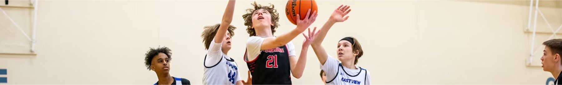 High School Basketball Team Player With Final Layup To Win the Regiona